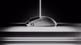Logitech PRO X2 SUPERSTRIKE mouse in Black & White, left side