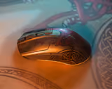 SteelSeries CS2 Dragon Lore Edition mouse in Dragon Lore, left side